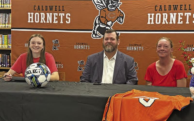 CALDWELL LADY HORNET soccer player Cadie Coston recently signed her letter of intent to continue her soccer journey at Hill College in Hillsboro. Last season, the Lady Rebels were 13-3-2 overall and a perfect 7-0 in conference play, including a trip to the NJCAA DI Women’s Soccer Championship. -- Photo courtesy of Tammie Novosad, CISD