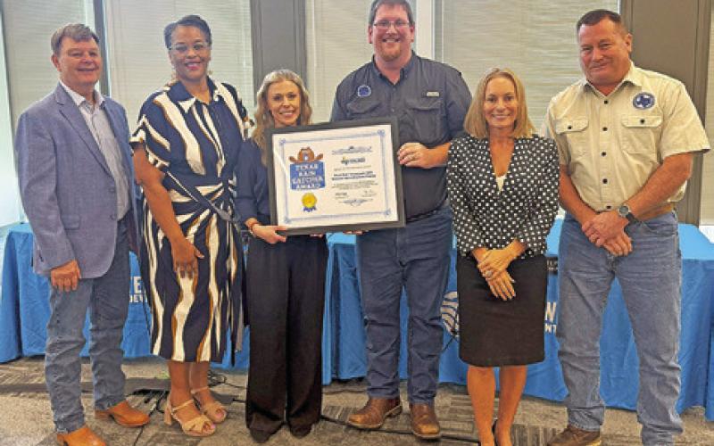 POST OAK SAVANNAH Groundwater Conservation District was recently named as a 2025 Texas Rain Catcher Award winner by the Texas Water Development Board. Pictured, from the left, are Gary Westbrook, TWDB Chairwoman L’Oreal Stepney, Jaclyn Wise, Michael Redman, TWDB Director Tonya Miller and Jeff Fisher.