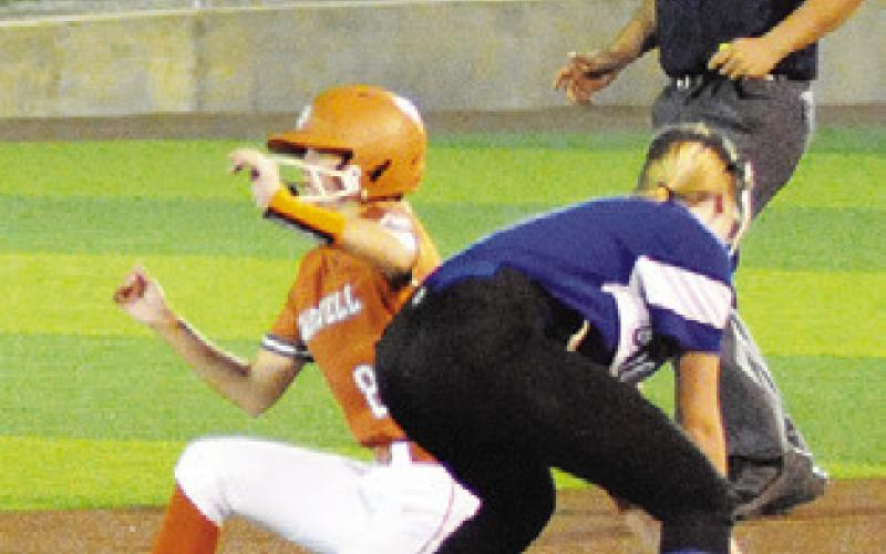 JILLIAN VYKUKAL slides safely into second base during the second inning of the Caldwell-Leon game on Friday. -- Tribune photo by Denise Squier