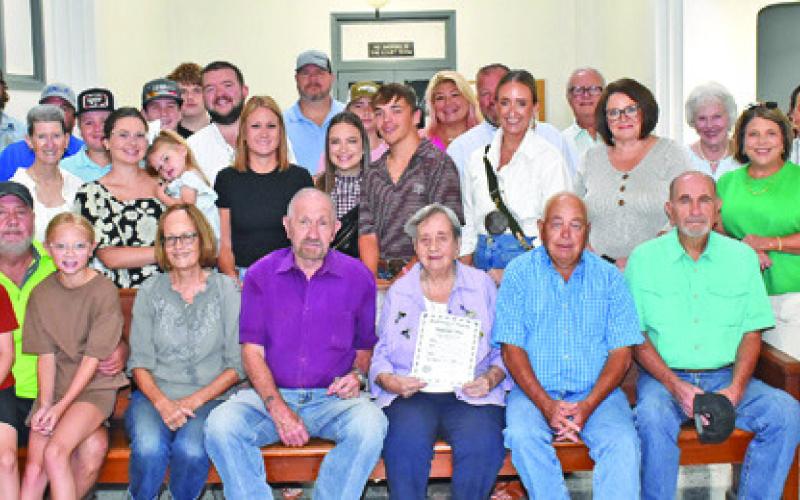 MADELINE GROCE, CELEBRATING her 106th, birthday is honored by her family and the Burleson County Commissioners at their Monday, July 28, meeting at the county courthouse.