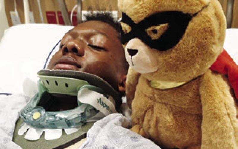 JURIAN MOORE rests in the hospital in Austin. Family members say they appreciate all the prayers and support.