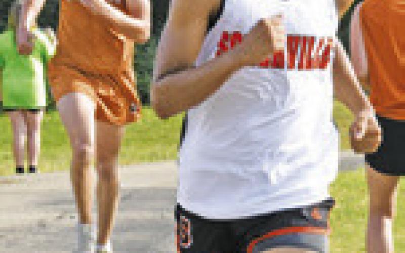 SOMERVILLE’S X’ZAVION Vela placed 11th in the high school boys race at last Saturday’s Caldwell Cross Country Invitational. Also pictured is Caldwell’s Colby Maresh who finished 15th. Tribune photo by Roy Sanders