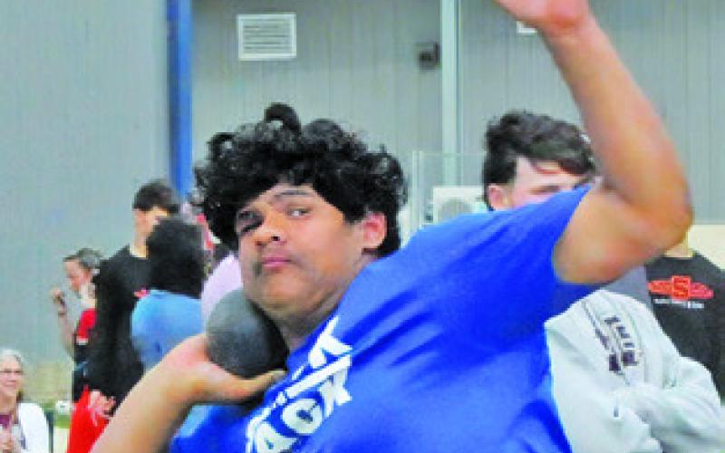 NOEL LARA SETS to throw a shot put during last week’s District 26-2A Track Meet in Snook Tribune photo by Denise Squier