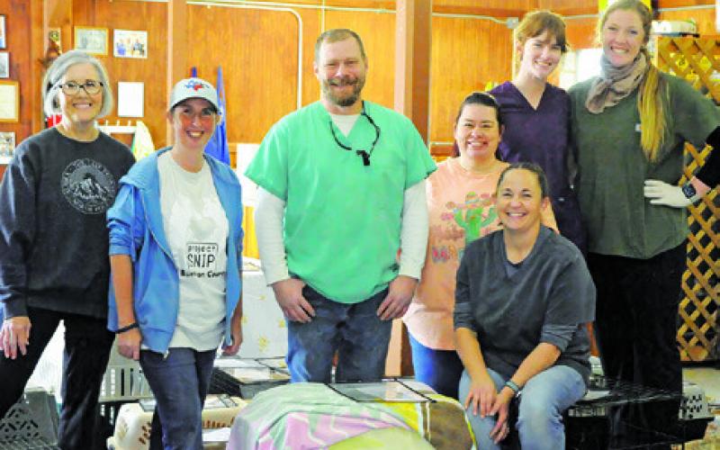 VOLUNTEERS AND STAFF AT THE feral and stray cat spay/neuter clinic in Somerville on Monday, April 7, hosted by HART and Project SNIP of Burleson County. Tribune photo by Denise Squier