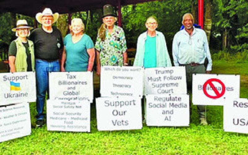 THESE 17 SIGNS WERE on display in Davidson Creek Park during Sunday’s ice cream social, sponsored by the Burleson County Democrats.