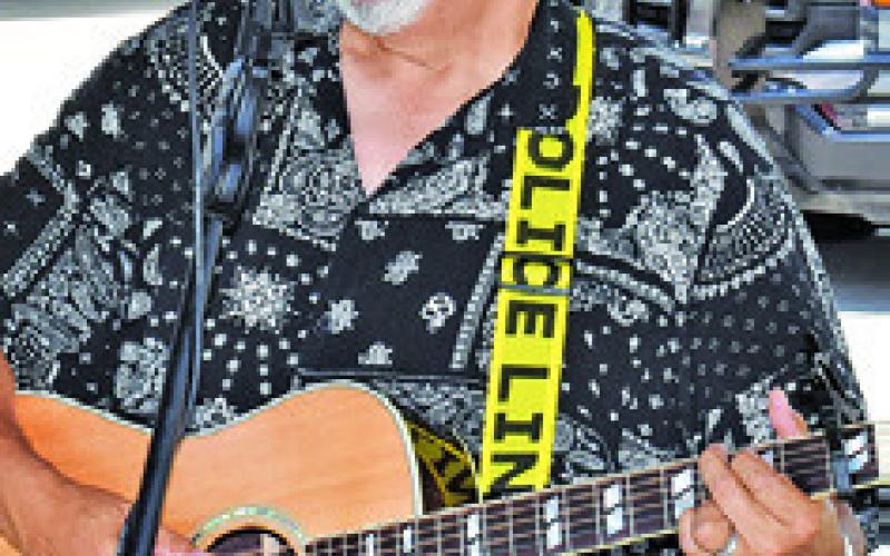 CHRIS AUSTIN Martinez entertains the crowd on Friday at Citizens State Bank.
