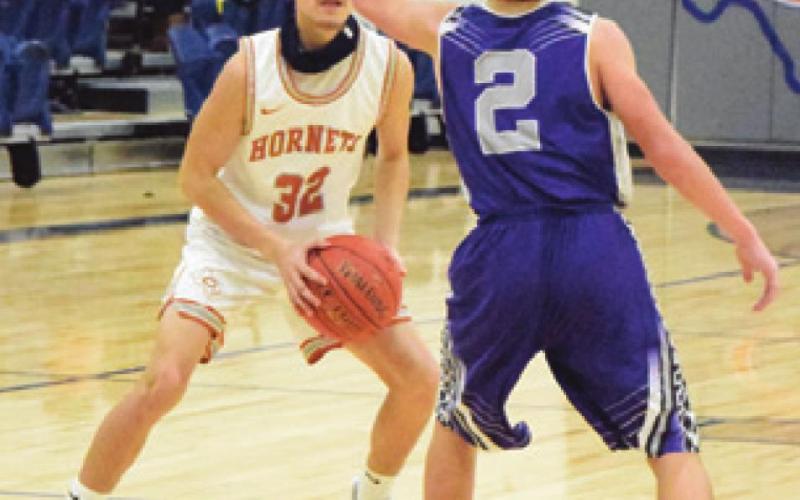 NICO LUCERO looks to pass the ball during the Caldwell-Florence game last Friday night in Caldwell. -- Tribune photo by Denise Squier