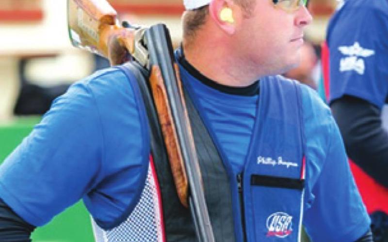 PHILLIP JUNGMAN WATCHES his competitors shoot during last week’s World Cup in Cypress. Jungman competes for Team USA.