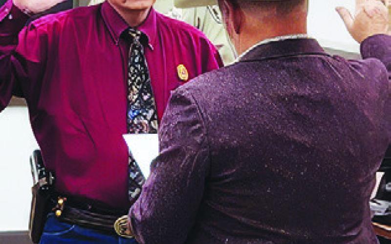 BURLESON COUNTY Sheriff Gene Hermes is sworn into office on Jan. 1 by Burleson County Judge Keith Schroeder.