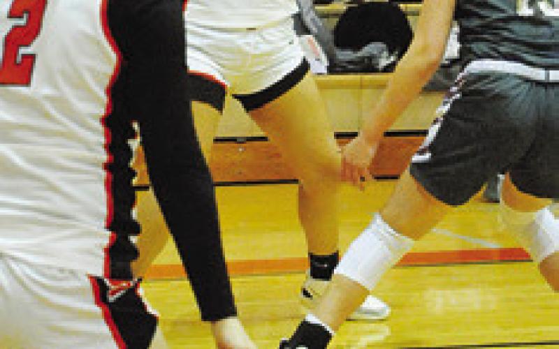 VIVIANNA MUNOZ looks to pass the ball to a teammate during the Somerville-Iola game last week. -- Tribune photo by Denise Squier