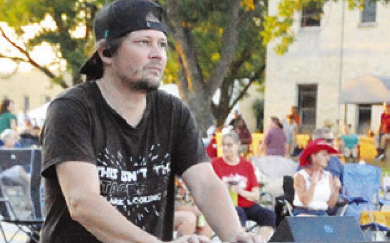 A GREAT SOUND cannot be accomplished without a great sound engineer. Pictured is the “sound guy” for Texas Unlimited Band at Saturday’s Summer Concert Series.