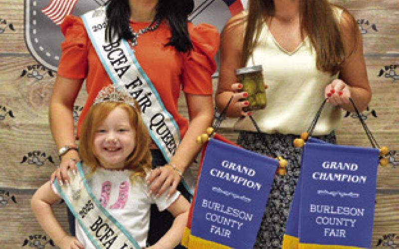 NICHOLE HEJL WON SEVERAL GRANDS in Adult Canned Foods. Also pictured are Fair Queen Kodi Hitchcock and Little Miss Taytum Hohlt. Tribune photo by Sabine Lazo