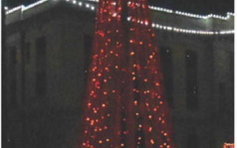 THESE CHRISTMAS decorations are enjoyed by motorists every night at the Burleson County Courthouse lawn.