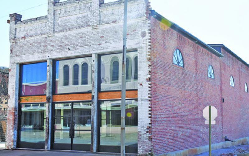 CONSTRUCTION CONTINUES ON this building owned by Pat Novosad at Hill and Buck streets in Caldwell. Crews have made steady progress in recent months at this historic location. Tribune photo by Roy Sanders