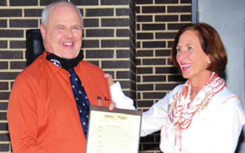 TEXAS SENATOR LOIS Kolkhorst presents Caldwell ISD Superintendent Andrew Peters with a proclamation honoring him for being named Region 6 Superintendent of the Year.