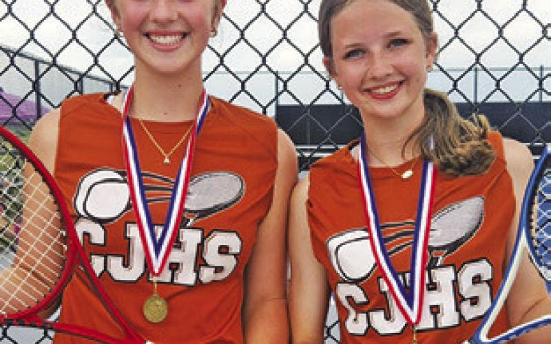 ABBY VOGLER and Lydia Hicks won the eighth-grade Division A girls doubles title at the junior high tennis championships.