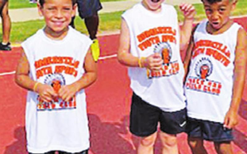 SOMERVILLE YOUTH Sports athletes, Caesyn Rodriguez, Xander Groce and Artisten Sims, competed at the Bryan Thunderbolts Invitational Track Meet last month.