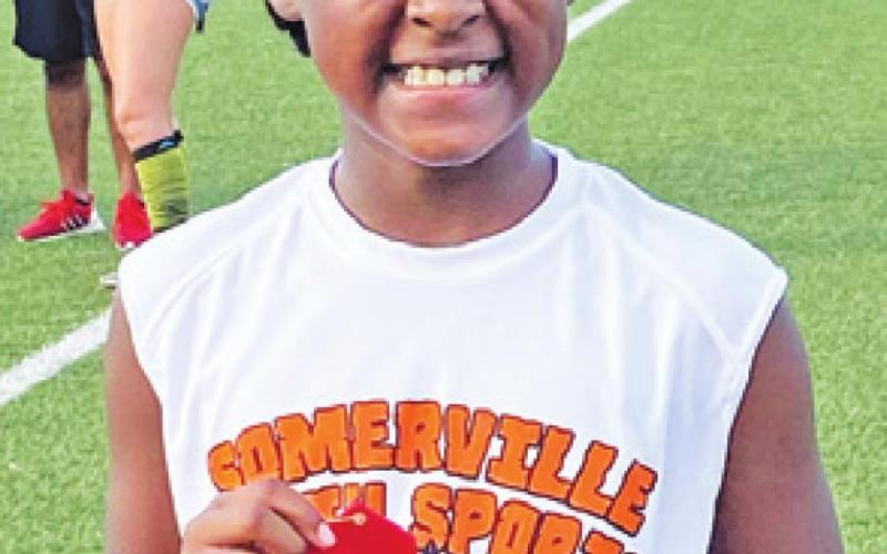 CIANNA ELLIS earned a second place ribbon at the Bryan Thunderbolts Invitational Track Meet last month in Bryan.