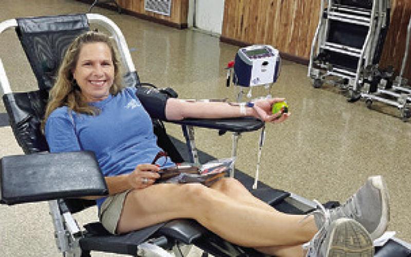CALDWELL VFW POST 4458 in partnership with the Gulf Coast Regional Blood Center held a blood drive on Friday, March 15. Pictured is Patricia Jennings donating blood during the event.