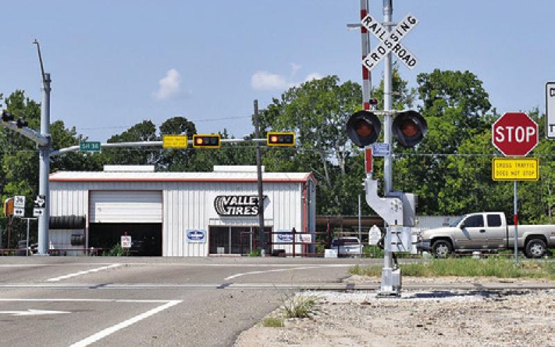 THE INTERSECTION AT F.M. 60 East and State Highway 36 South, as seen from F.M. 60. Work continues on a traffic signal.