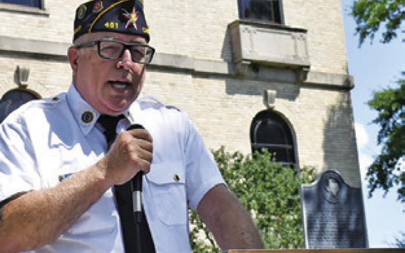 LEE HOERMANN addresses the crowd on Monday at the Memorial Day ceremony at the Burleson County War Memorial.