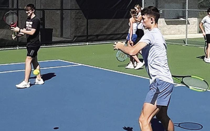 MANY STUDENT-ATHLETES attended Hornet Tennis Camp last week -- with students ranging from third to 12th grade.