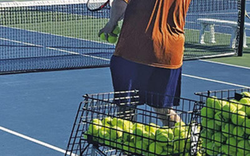 CALDWELL COACHES give student-athletes one-on-one time at Hornet Tennis Camp.