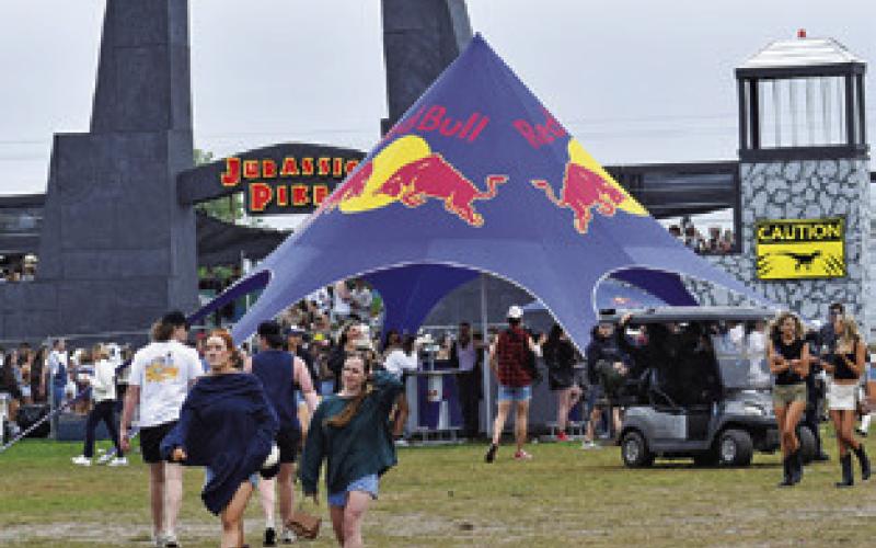 ATTENDEES ENJOY A fun afternoon at Chilifest last Saturday. The annual festival draw another large crowd. Tribune photo by Roy Sanders