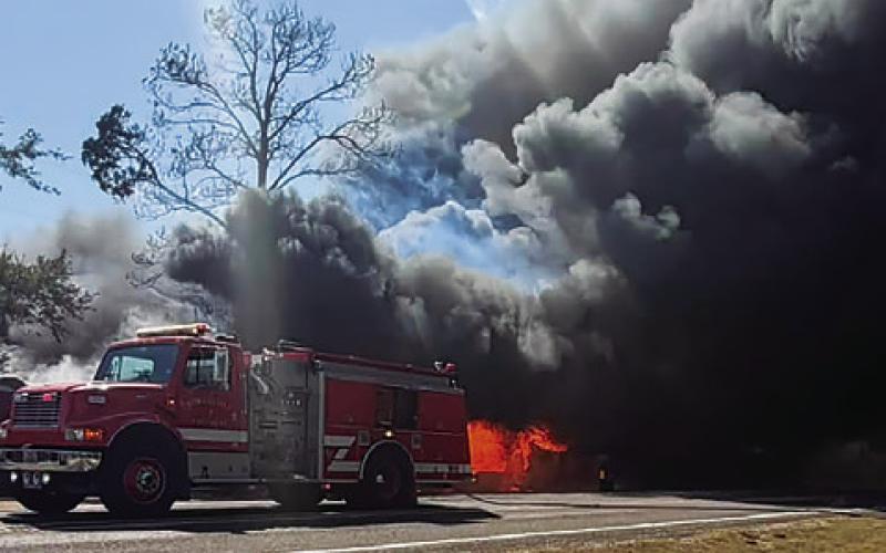 BLACK SMOKE EMERGES from this fire off Park Road 4. Photo courtesy of the Burleson County Sheriff’s Office