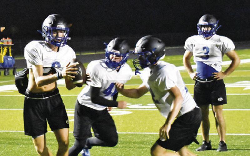 SNOOK’S OFFENSE RUNS a play during a recent practice.