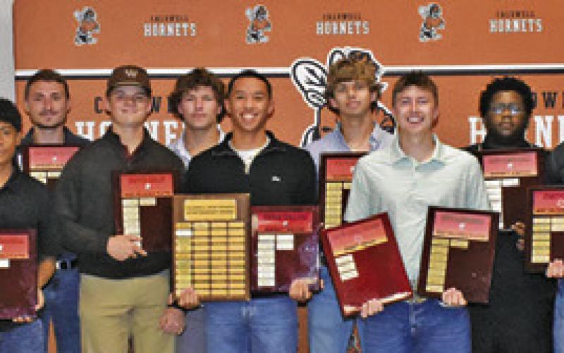 THE BOYS WINNERS at the annual athletic banquet included, from left, Landon Vykukal, Spencer Ellis, Rylan Cross, Alberto Valdez, Blake Taylor, Cooper Schluens, Kaden Fritsche, Dylan Carter, Chase Faust, Cayden Zboril, Kayden Robertson, Coy Becka, Joe Walker Herman and Shane Clements.