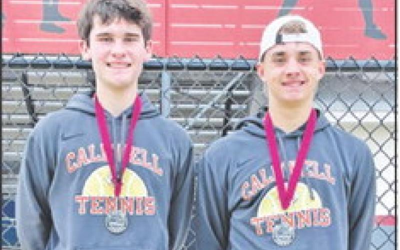 CALDWELL’S CONNER HUGHSON and Waylon Chapman placed second in A Boys Doubles at last week’s Bastrop Winter Cup.