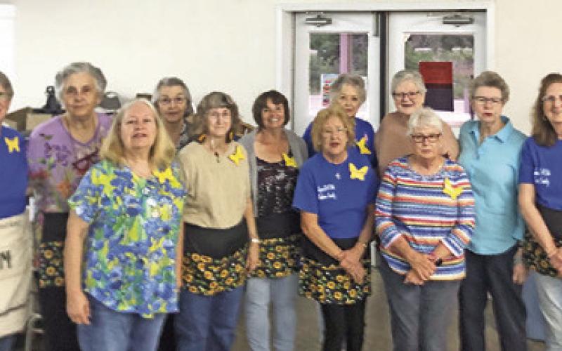 THE LYONS EXTENSION CLUB hosted their annual Spring Fling Plant/ Craft Sale on Saturday, March 28, at Harmony Baptist Church between Caldwell and Lyons. Pictured are Fran Gore, Sande Ober, Linda Pollard, Terri Sissom, Cathy Moore, Eileen Barnes, Claudia Pittman, Charlene Mueller, Peggy Robinson, Phyllis Koenig, Carolyn Brinkman and Debbi Schumacher. Photo courtesy of the Lyons EEA