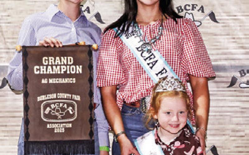 LYDIA HICKS EXHIBITED the Grand Champion Ag Mech project at the 2025 Burleson County Fair. Also pictured are Burleson County Fair Queen Kodi Hitchcock and Little Miss Taytum Hohlt.