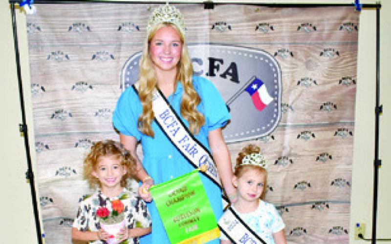 EVERLEYLANDOLTWONgrandchampionin children’s horticulture -- succulents and cacti. She is joined by Fair Queen Hadleigh Novosad and Little Miss Avery Grace Freeman.