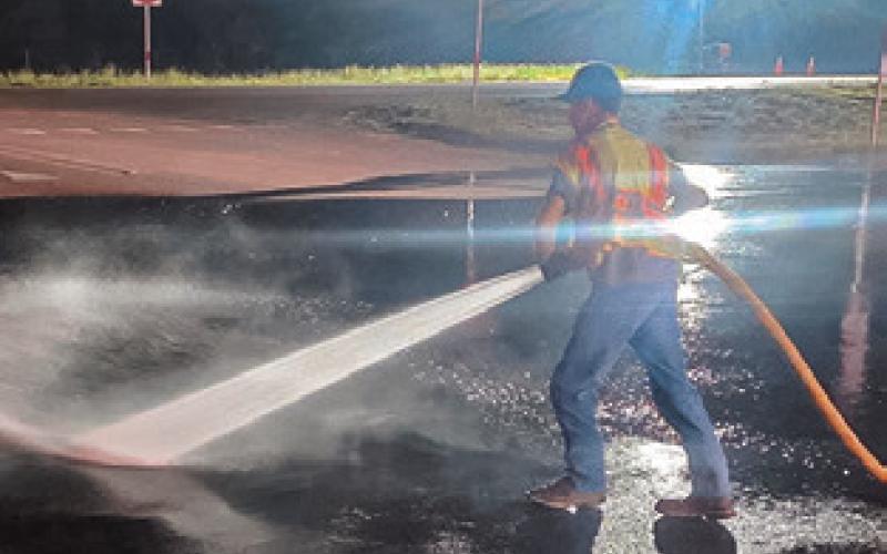 SNOOK VOLUNTEER Fire Department personnel had to wash down roads around the Chilifest site Friday night, removing mud to improve roadway safety for the public -- until around 3 a.m. on Saturday morning. Photo courtesy of Snook VFD