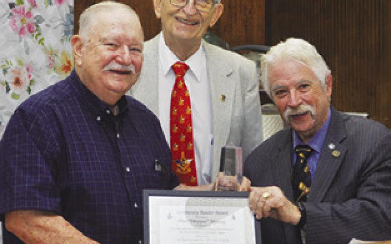 SKIPPER MURRAY, left, recently was honored by Lee Scott Masonic Lodge No. 793 in Somerville for his years of community service in the Somerville area with the Community Builder Award during a dinner on June 22.