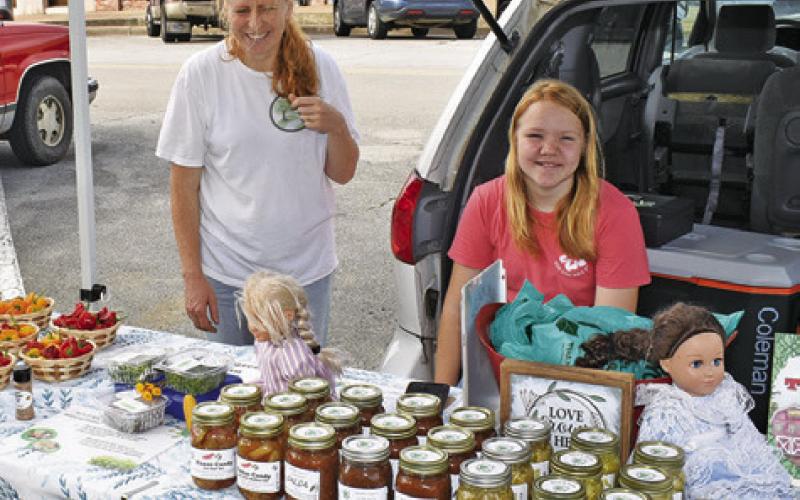 HOPE SPRINGS FARM greets visitors on Saturday, July 18, at the Burleson County Farmers Market at the courthouse square.