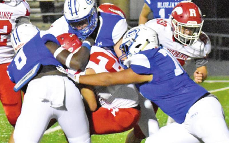 THE SNOOK DEFENSE tackles this Rocksprings ball carrier.