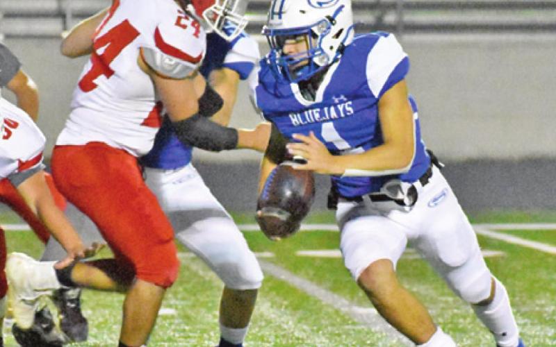 SNOOK’S GARRETT LERO breaks free against Rocksprings.