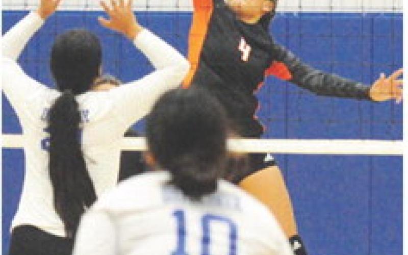 SOMERVILLE’S GABBY JACKSON reaches for the kill during the Lady Yeguas’ win over Dime Box. -- Tribune photo by Denise Squier