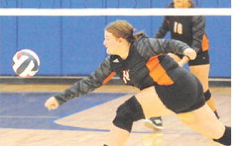 SOMERVILLE’S AUBREY KOVASOVIC lunges to save the ball from hittin the floor during the Somerville-Dime Box match last Friday.