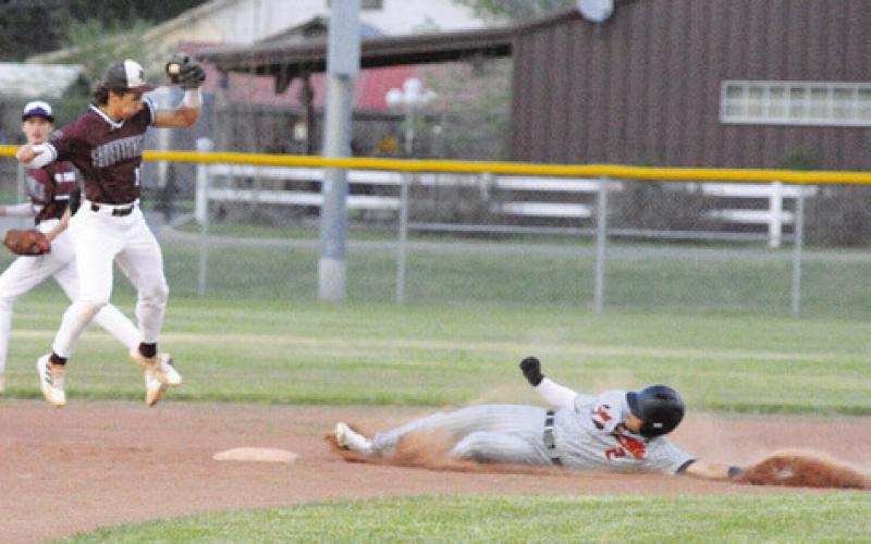 SOMERVILLE’S IAN TEAGUE slides into second base against Fayetteville. -- Tribune photo by Denise Squier