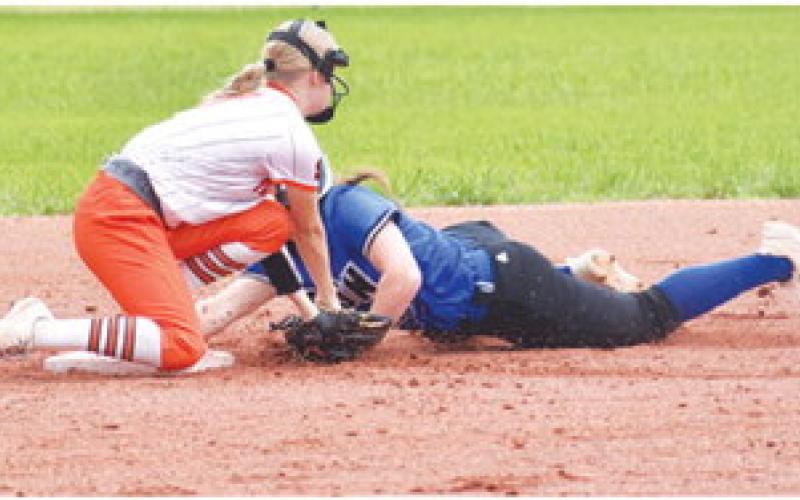 SOMERVILLE’S CAYLA BALANGA attempts to tag out a Leon runner sliding into second base. -- Tribune photo by Roy Sanders