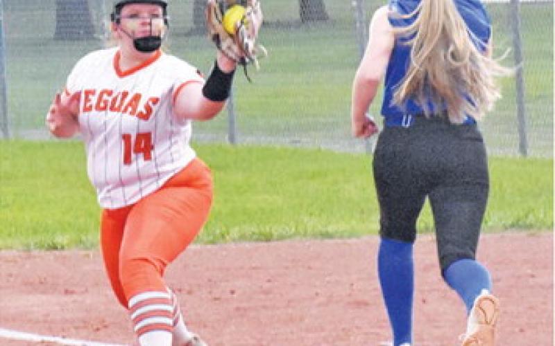 SOMERVILLE’S AUBREY KOVASOVIC catches the ball for a force out at first base during the Lady Yeguas’ bi-district game last Friday night.