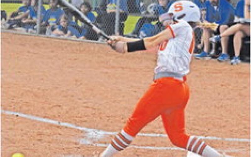 ABIGAIL FLENCHER hits the ball during the Somerville-Leon bi-district game last Friday.