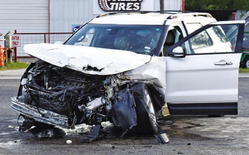 THIS SUV WAS damaged on Wednesday night in a three-vehicle accident at the intersection of F.M. 60 and State Highway 36 South. Tribune photo by Roy Sanders