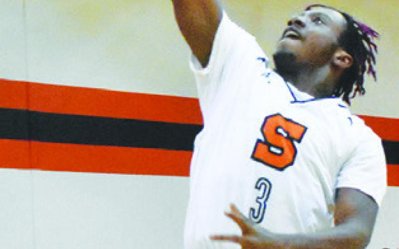 SOMERVILLE’S D.J. Bryant takes a shot against Bartlett in game one.