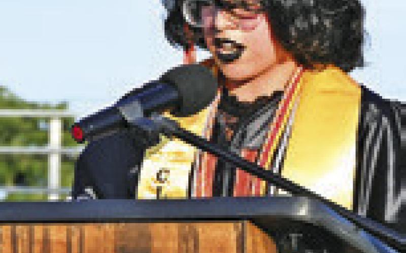 SOMERVILLE SALUTATORIAN Gizelle Cisneros address her classmates at Friday’s graduation ceremony at Yegua Field. Tribune photo by Denise Squier