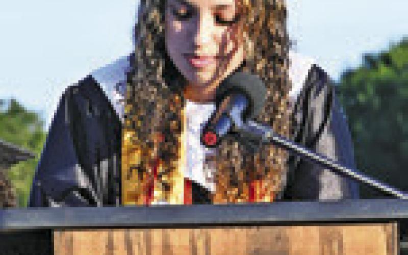 SOMERVILLE VALEDICTORIAN Gracie Strange address her classmates at Friday’s graduation ceremony at Yegua Field. Tribune photo by Denise Squier